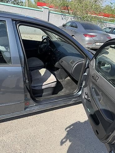 06 шоха: Skoda Fabia: 2006 г., 1.2 л, Ручные, Бензин, Хэтчбэк — 2