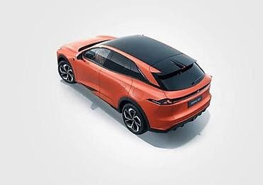 kia clarus: Электрический кроссовер (оранжевый металлик) с купеобразным силуэтом и — 4