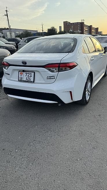 х5 2022: Toyota Corolla: 2022 г., 1.8 л, Автомат, Гибрид, Седан — 4