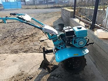 Мотоблок с прицепным навесным комплектом Описание: - Бензиновый
