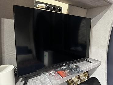 телевизор 40: Телевизор Haier с диагональю около 32–40" (по габаритам на фото) — 1