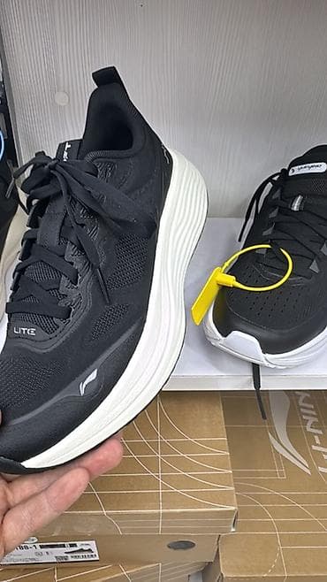 Личные вещи: Кроссовки Li-Ning, женские подростковые черные, белые - — 1