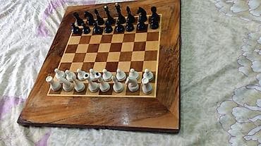 Дроны: Продаю шахматы. Шахматы Советские, размер доски 63х57 см, есть съемные — 3