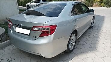 брала: Toyota Camry: 2012 г., 2.5 л, Вариатор, Гибрид, Седан — 2