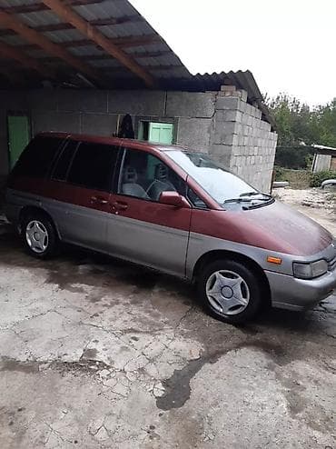 Nissan Prairie: 1991 г., 2 л, Механика, Бензин, Минивэн — 1