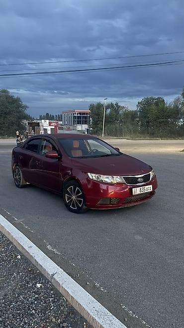 Kia Cerato: 2011 г., 1.6 л, Механика, Газ, Седан