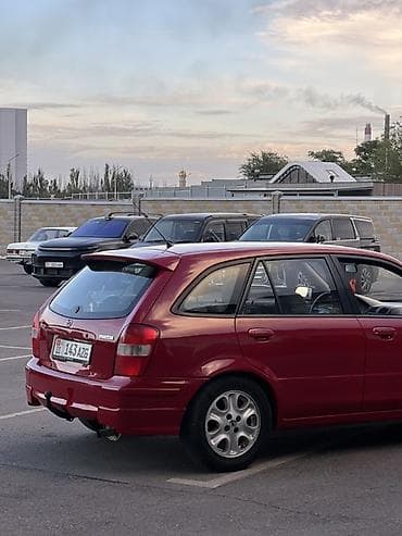 авто лейлек: Mazda 323: 1998 г., 1.5 л, Кол менен иштөөчү, Бензин, Универсал — 4