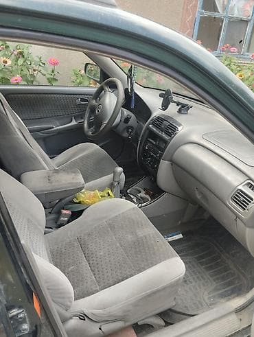 бампер тарнео: Mazda 626: 1992 г., Автомат, Универсал — 2