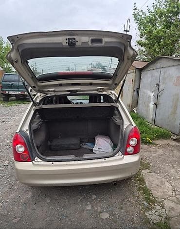 lada 2105: Mazda Familia: 2002 г., 1.3 л, Механика, Бензин, Универсал — 5