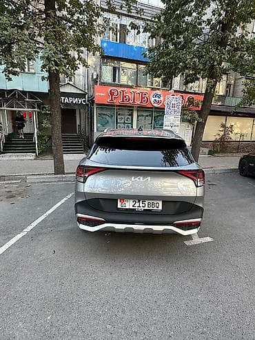 шины 11: Kia Sportage: 2022 г., 1.6 л, Автомат, Гибрид, Кроссовер — 4