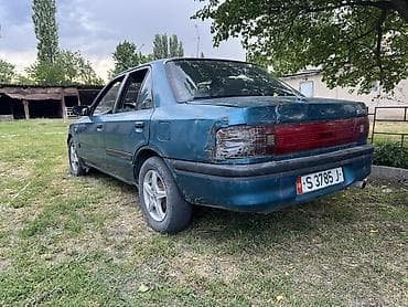 gac aion y: Mazda 323: 1990 г., Механика, Бензин, Седан — 3