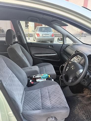 женщину: Honda Stream: 2005 г., 1.7 л, Автомат, Бензин, Минивэн — 10