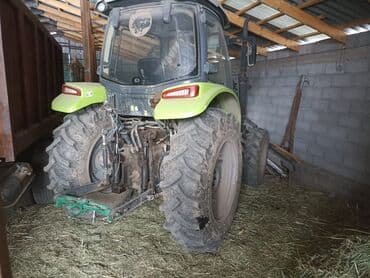 продаю связи с переездом: Трактор ZOOMLION RH1304 - Полноразмерный колесный трактор с кабиной — 1