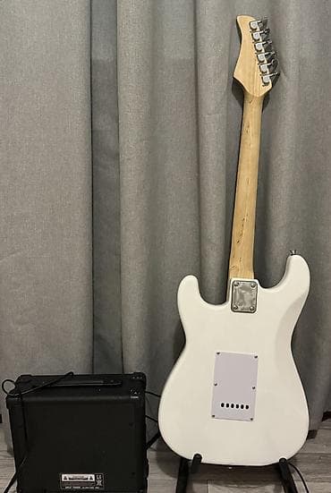 yamaha f310 гитара: Электрогитара формата Stratocaster-Style с комплектом: чехол медиаторы — 2