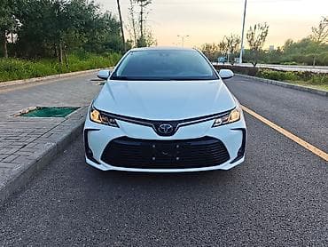 byd e5: Toyota Corolla: 2023 г., 1.8 л, Вариатор, Гибрид, Седан — 4
