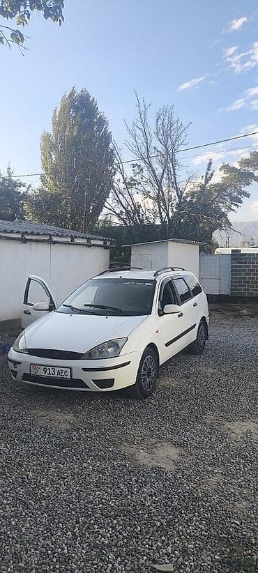 Унаа: Ford Focus: 2004 г., 1.8 л, Кол менен иштөөчү, Дизель, Универсал — 9