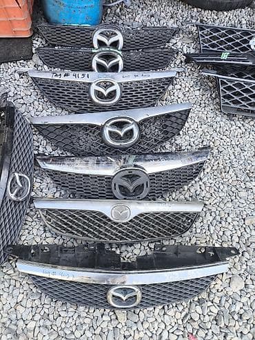 Решетка радиатора Mazda 2001 г., Б/у, Оригинал — 3