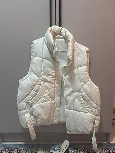 Спортивная одежда: Утеплённый женский жилет без рукавов, цвет молочный/айвори — 1