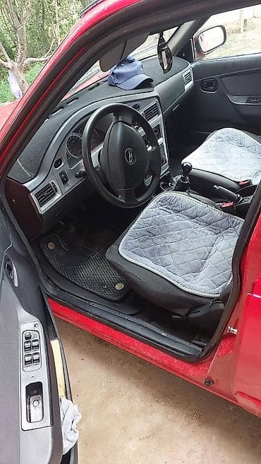 Унаа: Daewoo Nexia: 2011 г., 1.6 л, Кол менен иштөөчү, Бензин, Седан — 9