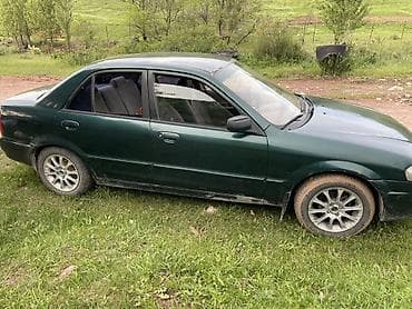 Mazda Protege: 1999 г., 1.6 л, Автомат, Бензин, Седан