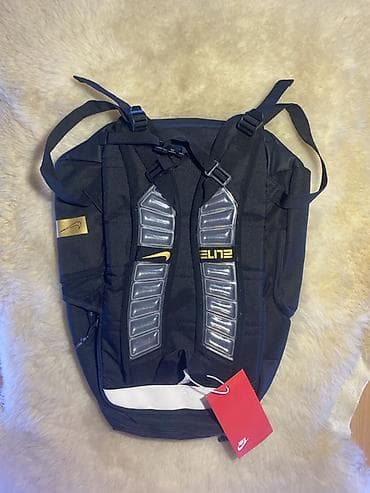 nike tech flece: Рюкзак Nike Elite черного цвета с желтыми акцентами. Модель — 2