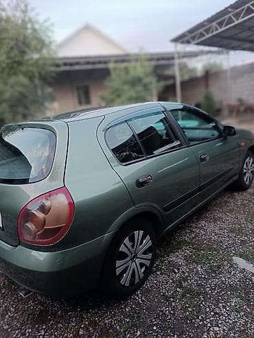 e star: Nissan Almera: 2003 г. — 2