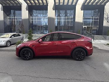 byd e2 2023: Tesla Model Y: 2020 г. — 7
