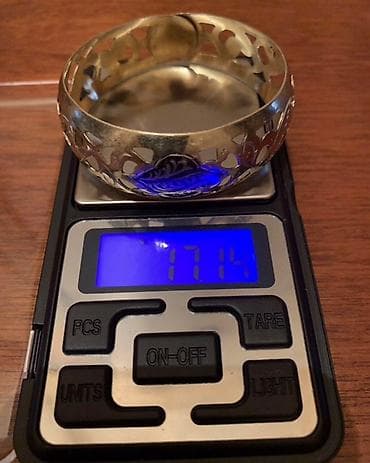 honor bend: Серебряный браслет с позолотой с ажурным орнаментом. В центре браслета — 9