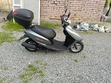 dio 27 af27: Скутер Honda (серия Dio) в серебристом цвете. Характеристики и — 2