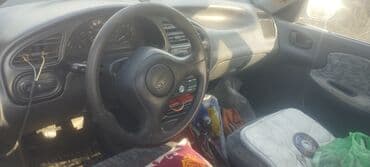 крыло нексия 1: Daewoo Lanos: 1996 г., Механика, Бензиновая, Седан — 3