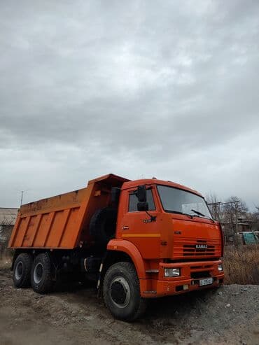 бетономешалка запчасть: Самосвал КАМАЗ 6520 (6x4), оранжевый. Характеристики и возможности: - — 5