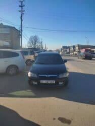 автомобиль с последующим выкупом: Mazda 323: 1999 г., 1.5 л, Механика, Бензин, Хэтчбэк — 7