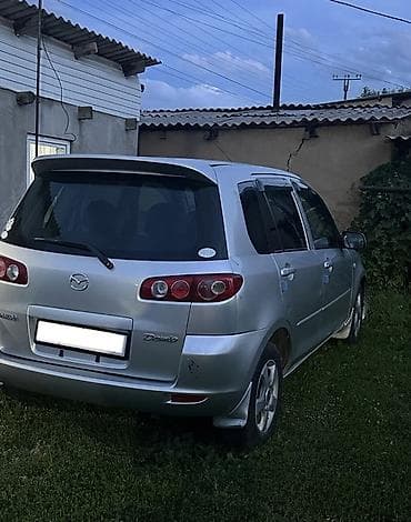 гов 2: Mazda Demio: 2004 г., 1.3 л, Автомат, Бензин, Хэтчбэк — 2