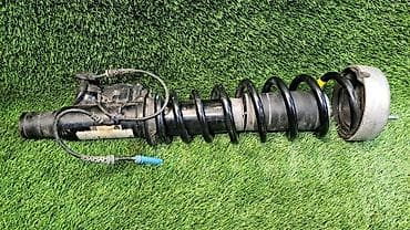 е70 e70: Передний амортизатор BMW 2009 г., Б/у, Оригинал — 5