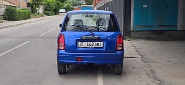 mini cuper: Daihatsu Cuore: 2003 г., 1 л, Автомат, Бензин, Купе — 5