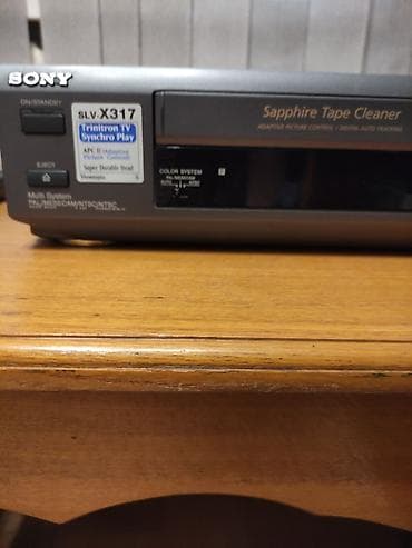 трекинг: Видеомагнитофон VHS Sony SLV‑X317 - Мультисистема: PAL/MESECAM/NTSC — 1