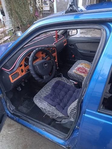Daewoo Nexia: 2010 г., 1.5 л, Кол менен иштөөчү, Бензин, Седан — 3