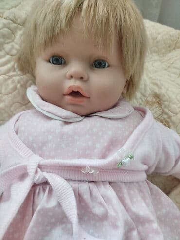 купить куклу фарфоровую: Кукла-пупс с светлыми волосами и голубыми глазами, одета в розовое — 2