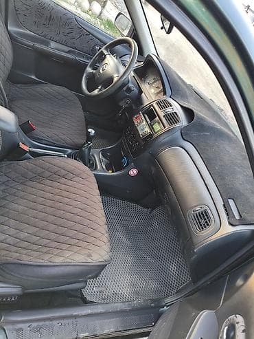 дайхатсу фероза: Mazda 323: 2000 г., 1.6 л, Механика, Бензин, Универсал — 7