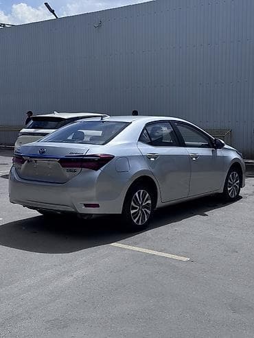 на тойоту: Toyota Corolla: 2019 г., 1.8 л, Робот, Гибрид, Седан — 5