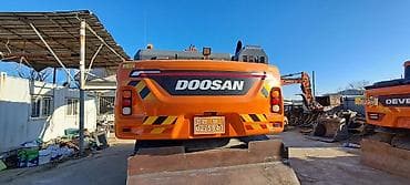 машна ош: Экскаватор, Doosan, 2016 г., Колесный — 2