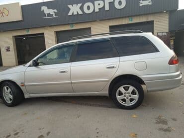 шкода практик: Универсал серебристого цвета. Особенности и оснащение: - Кузов — 1