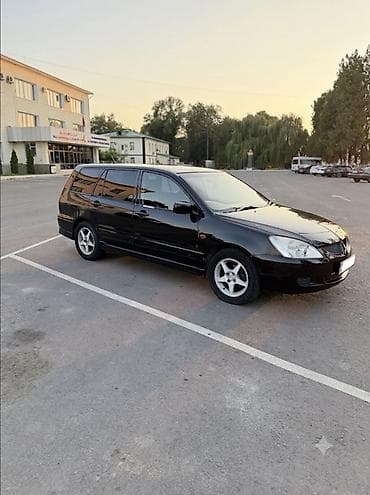Mitsubishi Lancer: 2001 г., 1.8 л, Вариатор, Бензин, Универсал