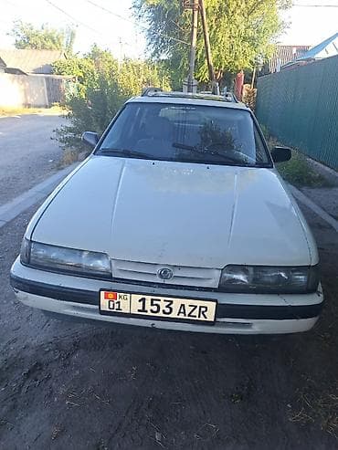 Транспорт: Mazda 626: 1993 г. — 6