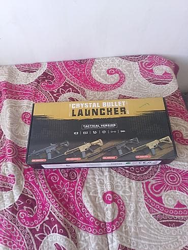 пистолет пузырьки: Игрушечный автомат «Crystal Bullet Launcher» (Tactical Version) — 2