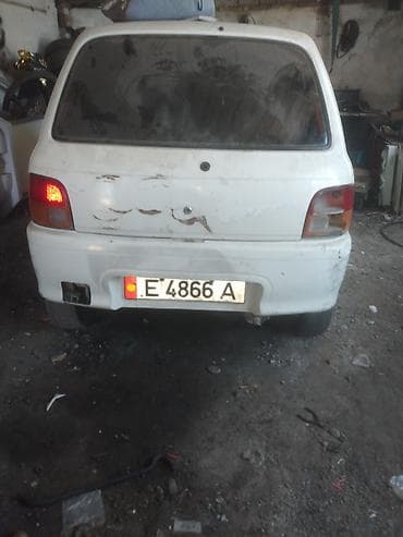 муравей с рулем: Daihatsu Cuore: 1995 г. — 5