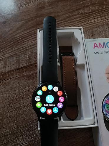 Смарт-часы с круглым сенсорным дисплеем. Меню в виде иконок, поддержка