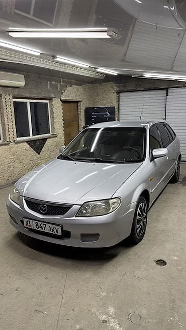 вместе дешевле: Mazda 323: 2001 г., 1.6 л, Механика, Бензин, Универсал — 2
