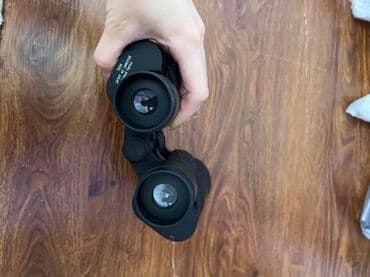 продаю связи с переездом: Бинокль 20x50, поле зрения 87 м/1000 м (направляющая маркировка — 4