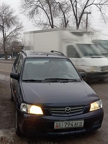 новое авто: Mazda Demio: 2002 г., 1.3 л, Механика, Бензин, Хэтчбэк — 1